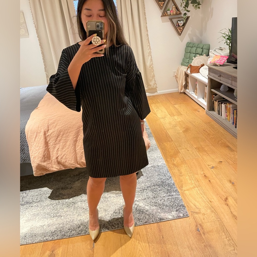 Pin-striped peplum sleeve dress